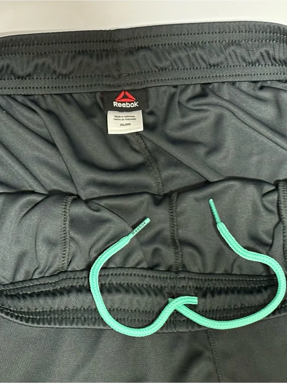 Reebok Black Athletic Shorts with Green Drawstring